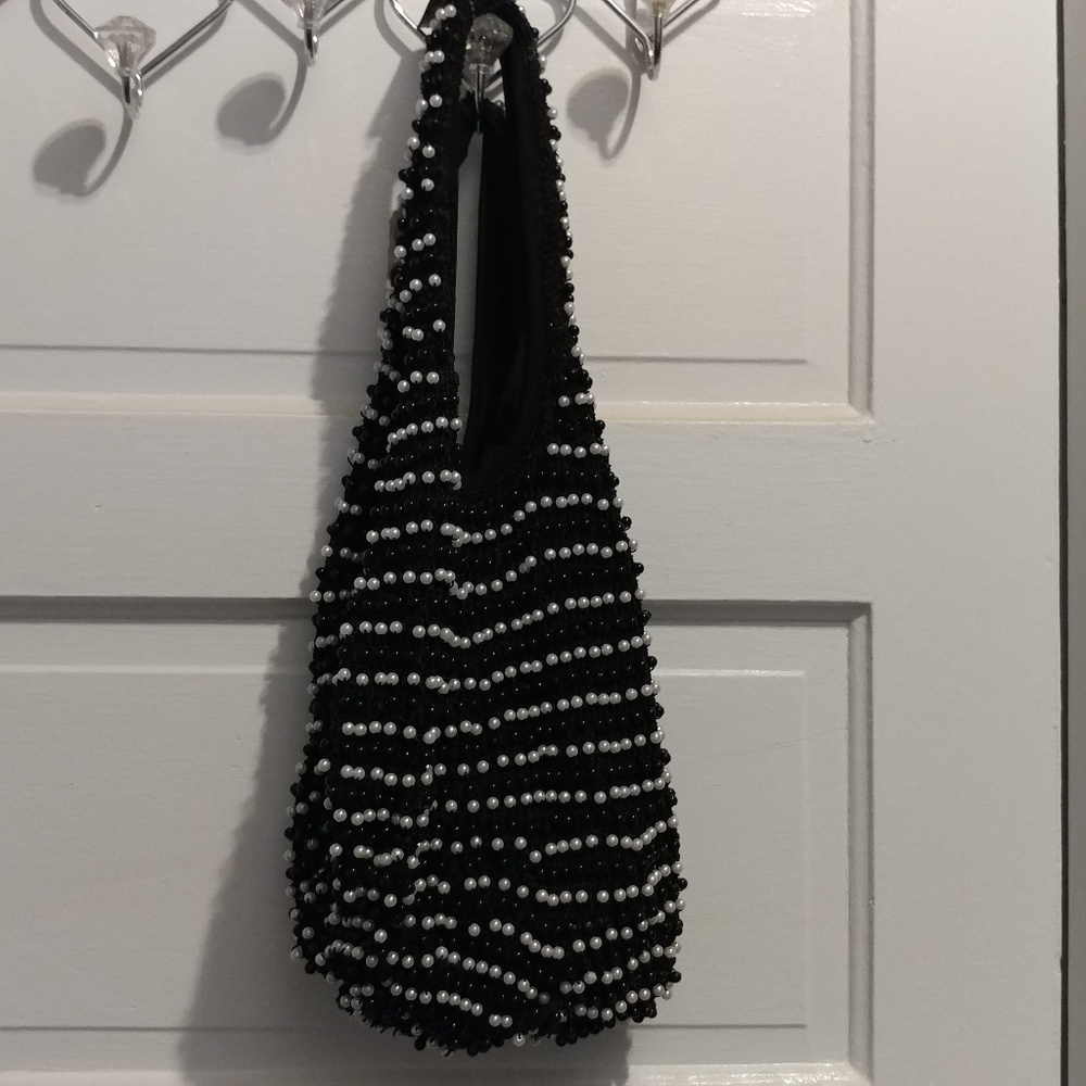Women's black and white beaded hobo handbag